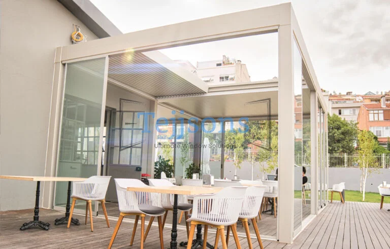 Bioclimatic motorized louvered pergola over modern terrace