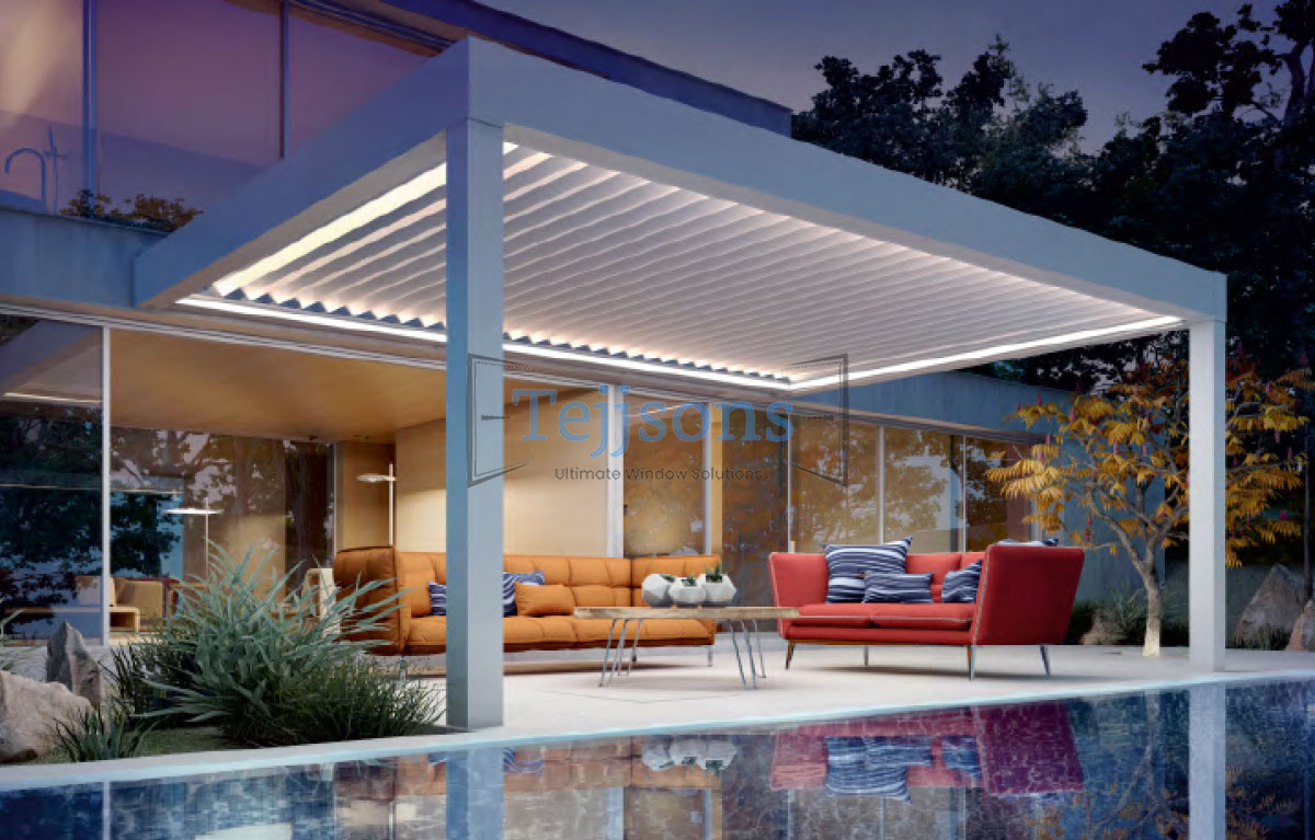 Bioclimatic louvered pergola with LED lighting over modern patio seating