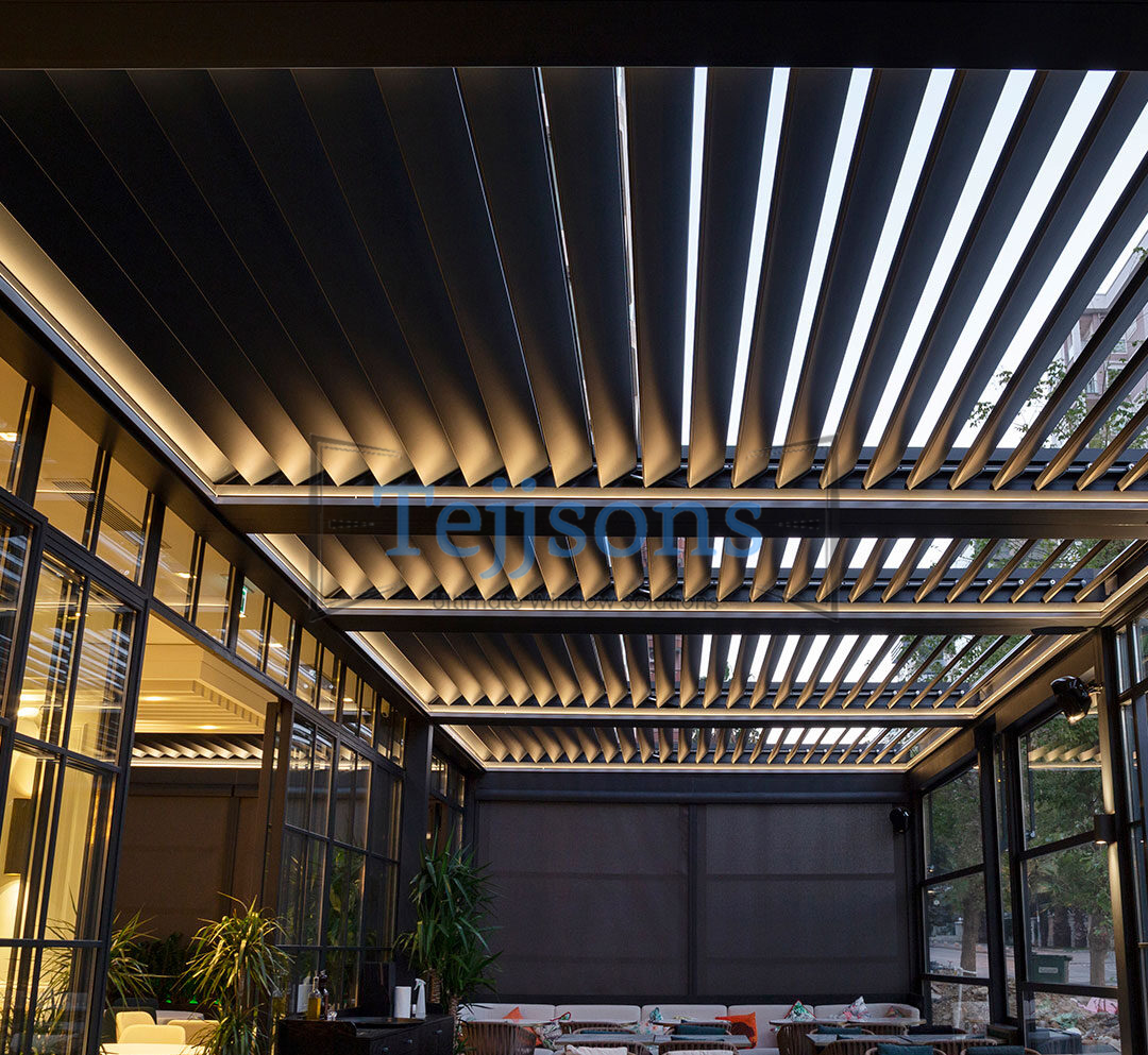 Modern bioclimatic pergola with adjustable louvers and LED lighting
