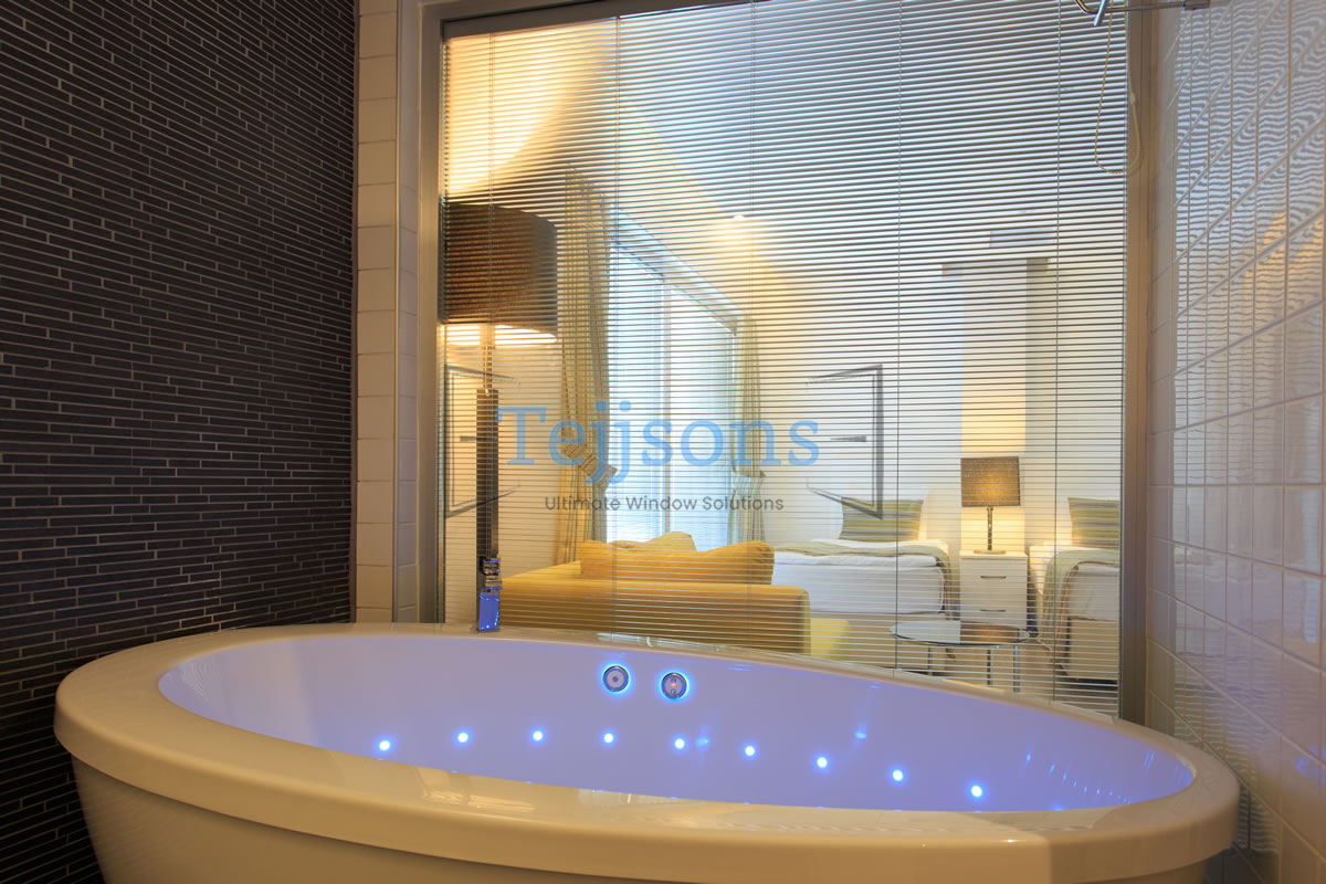 Modern luxury bathroom with integral blinds window